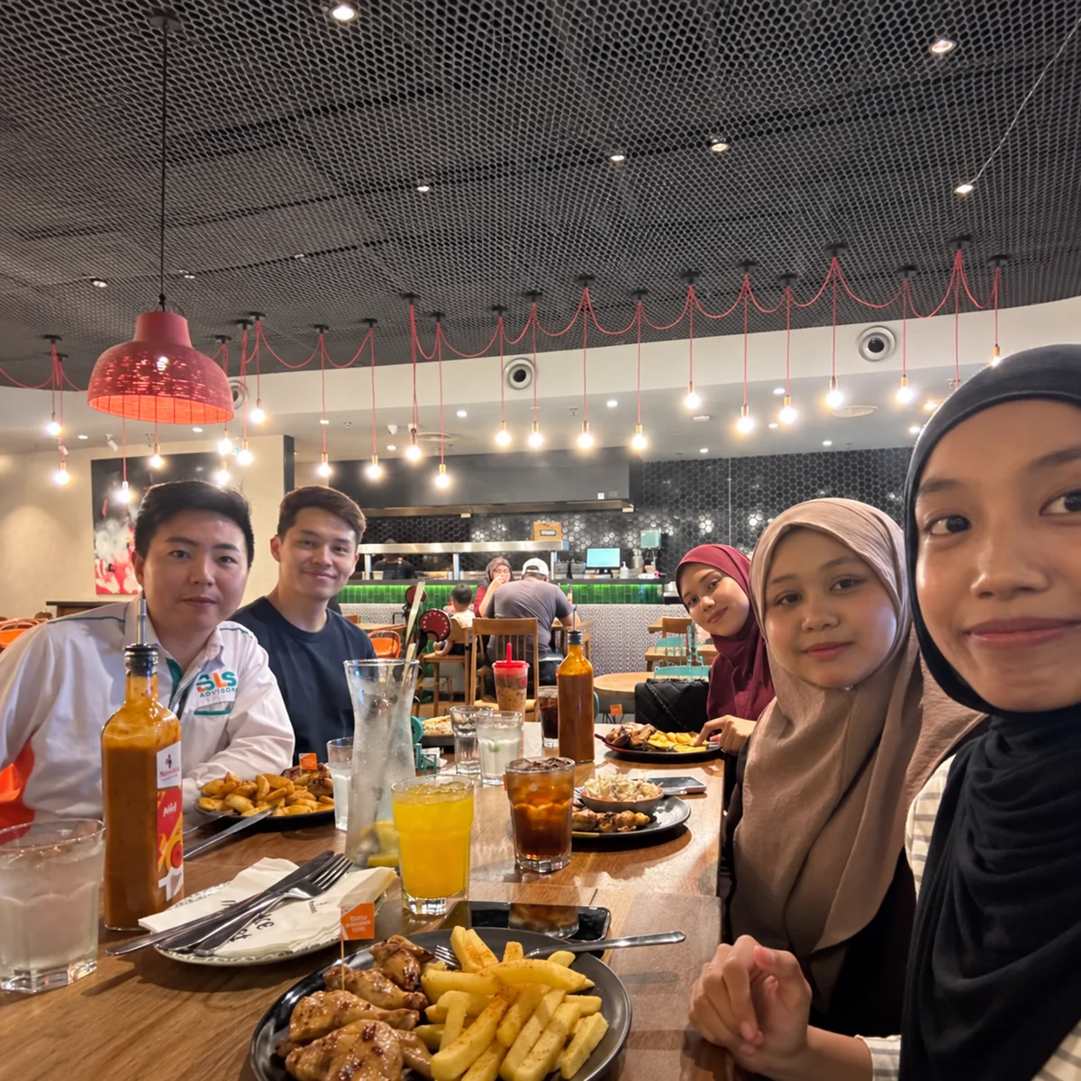 BLS Advisory team lunch at Nando's